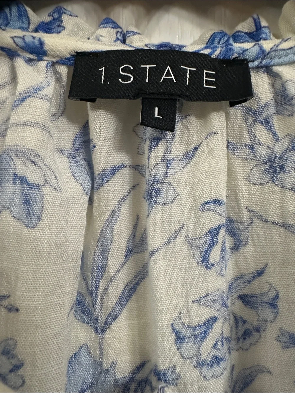 1. State Blue Floral Tie-Neck Sleeveless Top